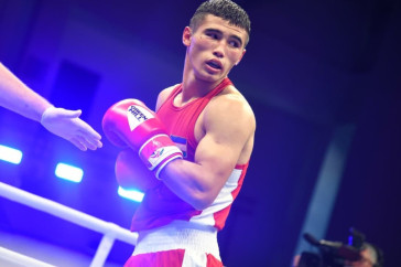 Фотография к новости: Казахский чемпион мира по боксу побывал в нокдауне и разгромил соперника в Узбекистане