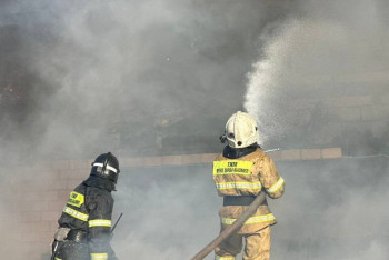 Фотография к новости: Крыша загорелась у дома в Астане