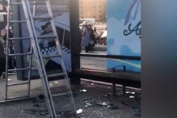 Рекламный щит упал на остановку в Актобе: есть пострадавшие