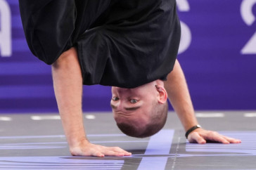 Фотография к новости: Би-бой Амир Закиров прорвался в четвертьфинал Олимпийских игр