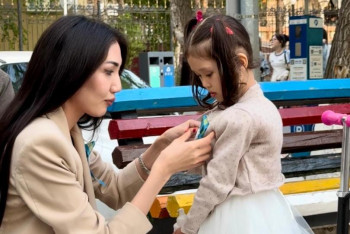 Фотография к новости: Ленты Победы раздали жителям и гостям Астаны