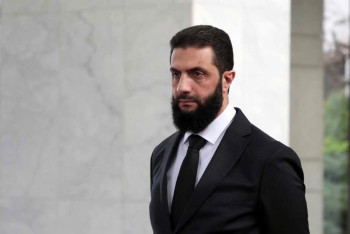 Фотография к новости: Великобритания сняла санкции с временного президента Сирии