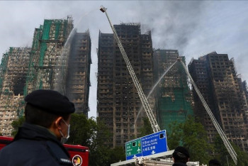 Число погибших при пожаре в Гонконге выросло до 160