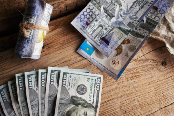 Фотография к новости: Тенге или доллар при ставке 18%: где хранить деньги выгоднее?